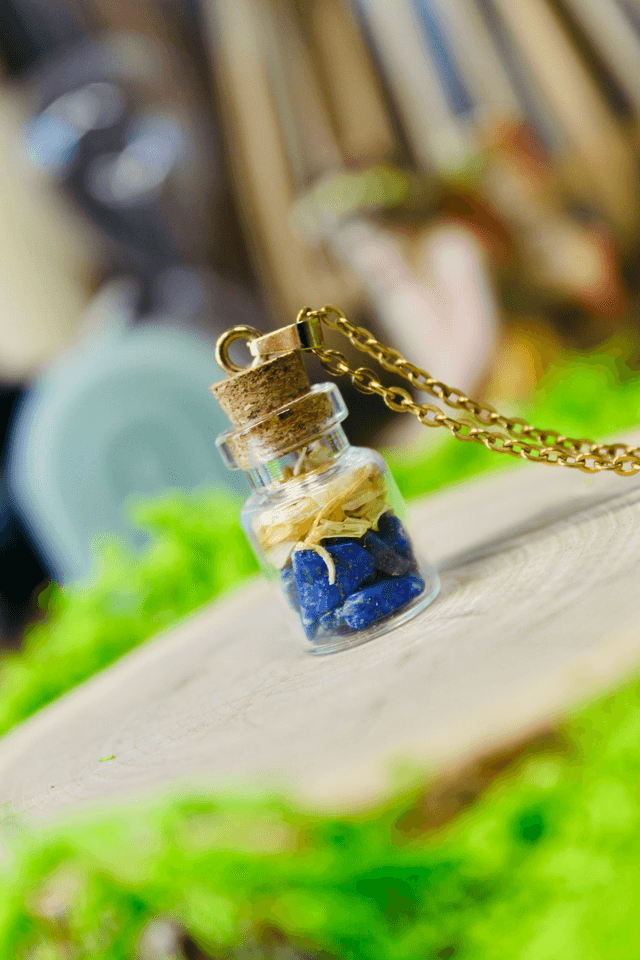 Pendentif fiole Expression joyeuse