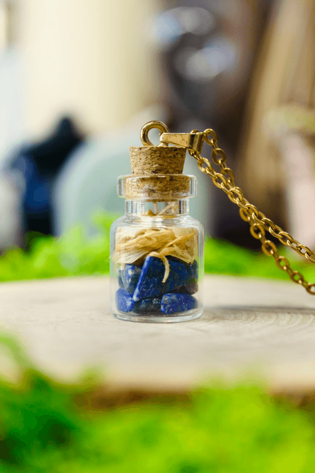Pendentif fiole Expression joyeuse